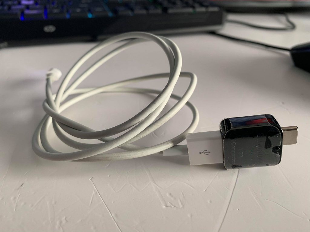 USB Connector connected to the Lightning Cable